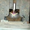 Bass end of hammer press before pressure